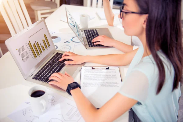 Concentrated  colleagues sitting at the table — Stock Photo, Image