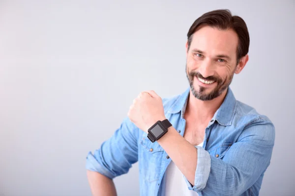 Man showing smart watch on his wrist — Stock Photo, Image