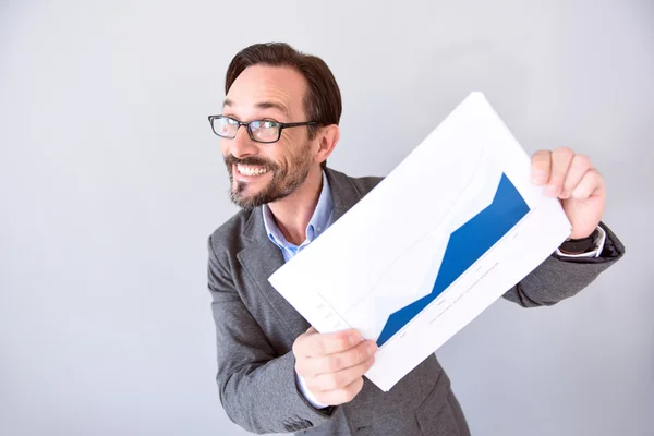 Man holding board with graph — Stock Photo, Image