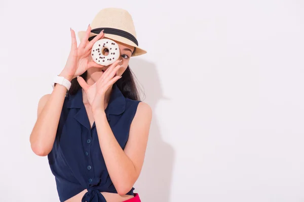 Pleasant positive woman holding donut — Stock Photo, Image