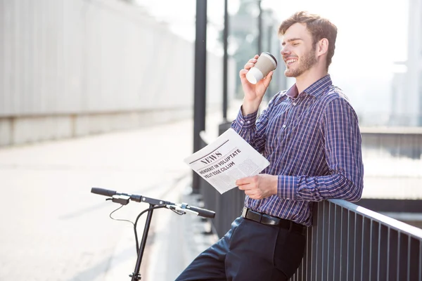 Delighted man drinking coffee — Stock Photo, Image