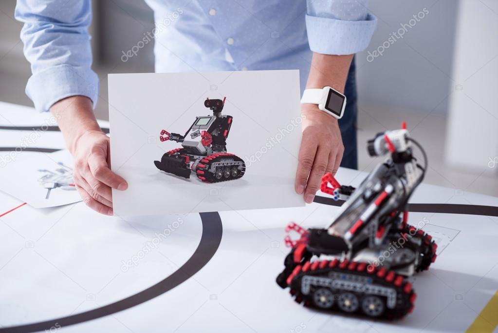 Both image and a real toy robot