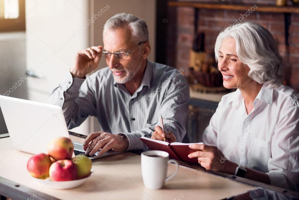 Mature couple doing internet research