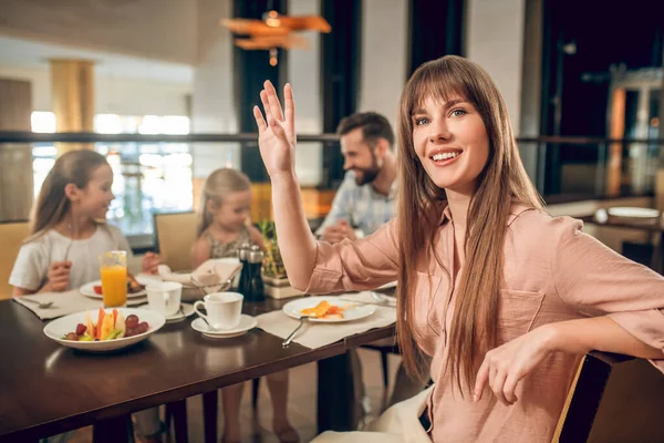 Cute family spending time together at breakfast — Stock Photo, Image