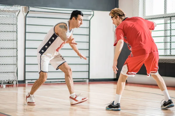 Young men playing basketball and feeling excited — Foto de Stock