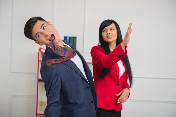 Podnikatelka, dát políček do tváře flirtování kolegovi — Stock fotografie