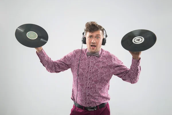 DJ posing with vinyl record — Stock Photo, Image