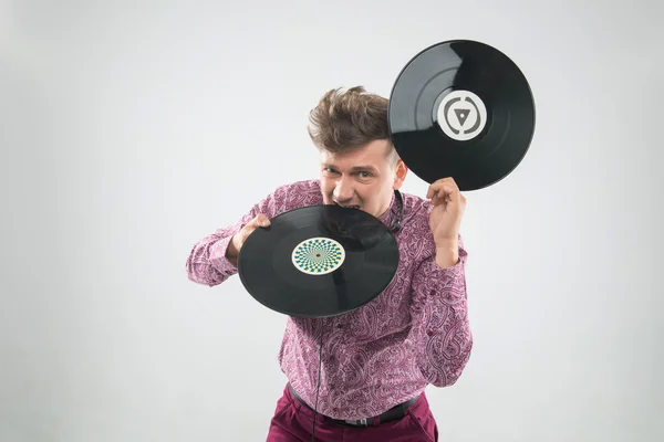 DJ biting disco de vinil — Fotografia de Stock