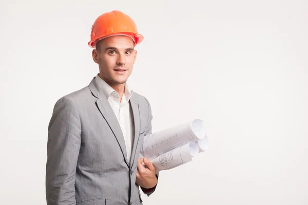 Jovem bonito arquiteto engenheiro posando — Fotografia de Stock