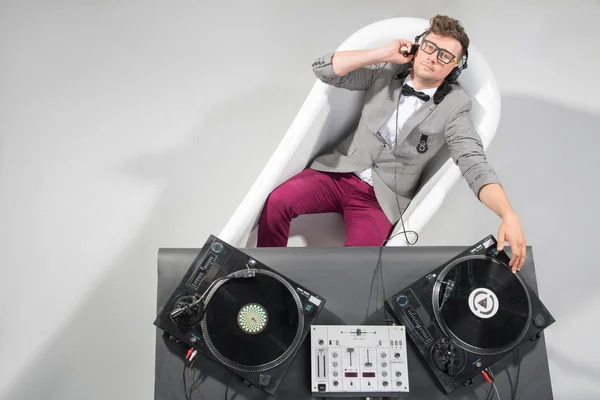 Dj at work in bath isolated on white background — Stock Photo, Image