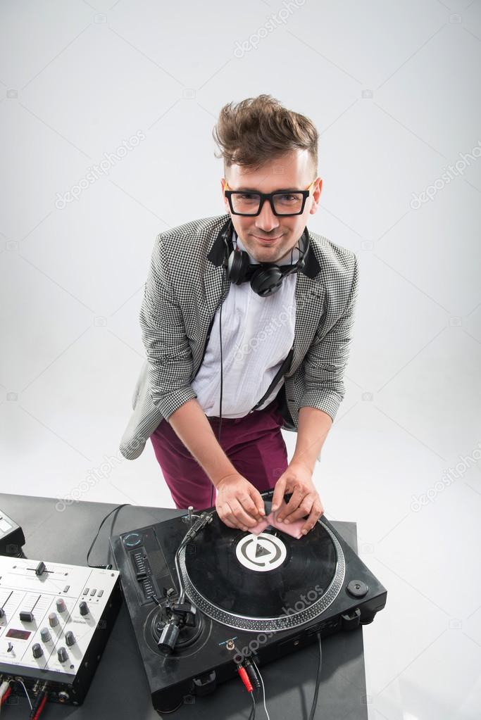 Dj at work isolated on white background
