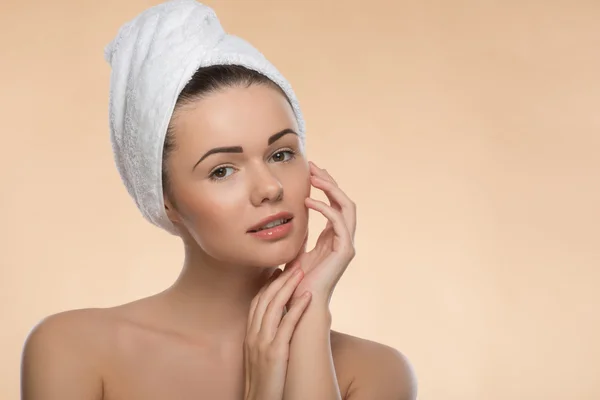 Portrait of girl with a towel on her head — Stock Photo, Image