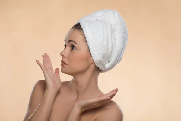 Portrait of girl with a towel on her head — Stock Photo, Image