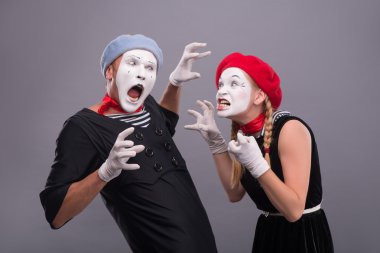Mimes screaming on each other clipart
