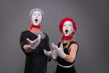 Portrait of funny mime couple with white faces and emotions isol clipart
