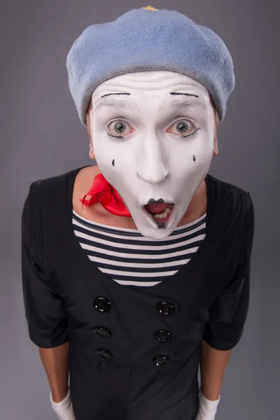 Portrait of male mime in red head and with white face isolated o — Stock Photo, Image