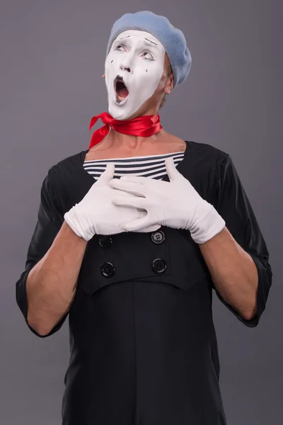 Portrait of male mime in red head and with white face isolated o — Stock Photo, Image