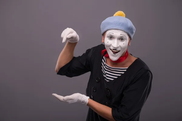 Portrait of young mime boy showing something with his hands — Stock Photo, Image