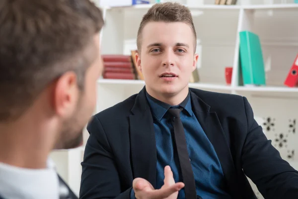 Close-up portrait of two handsome businessmen in suits — Stock Photo, Image