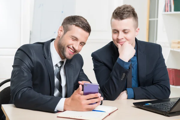 Waist-up portrait of two handsome businessmen in suits — Stock Photo, Image