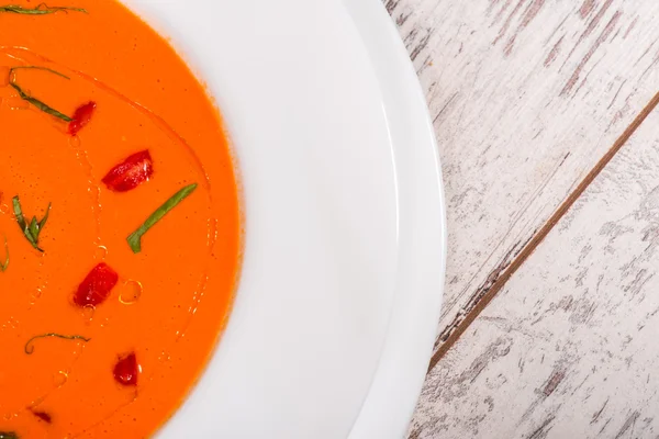 Picture of cold tasty tomato soup gazpacho with species on the w — Stock Photo, Image