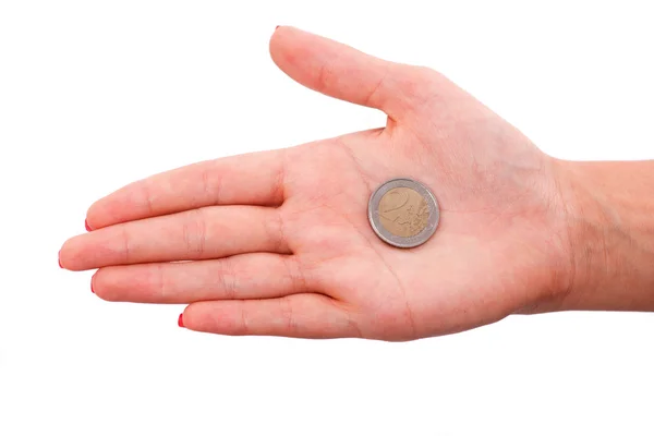 Uma moeda deitada na palma da mulher — Fotografia de Stock