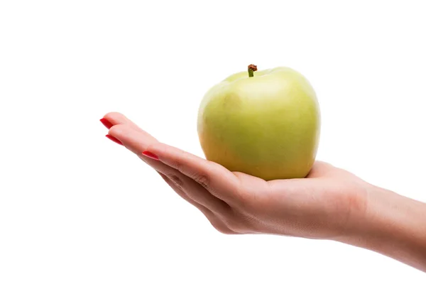 Vrouw bedrijf rijpe groene appel — Stockfoto