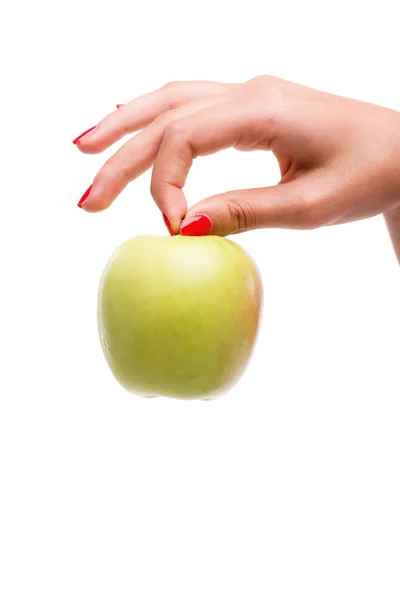 Mulher segurando maçã verde madura — Fotografia de Stock