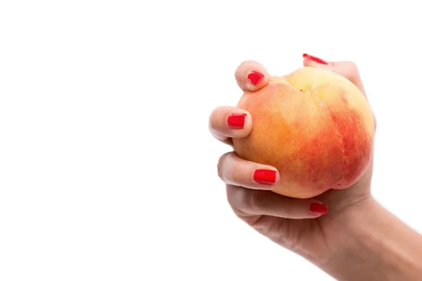 Woman holding ripe  peach. — Stock Photo, Image