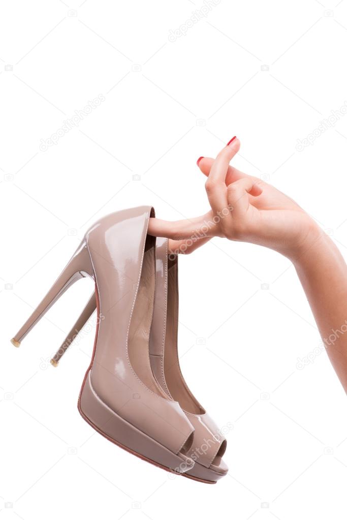 Woman holding nice grey high heels