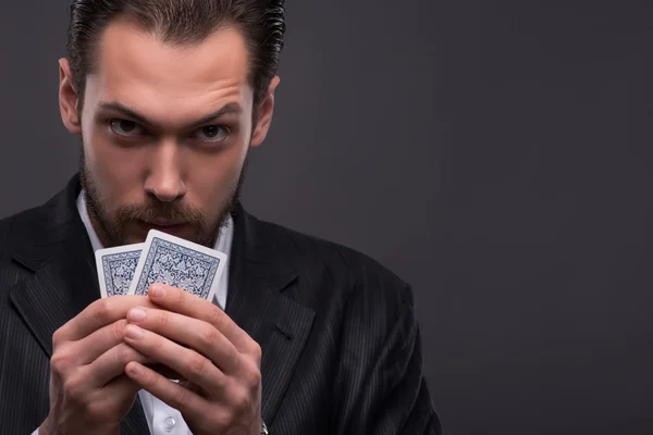 Handsome man and beautiful woman in casino — Stock Photo, Image