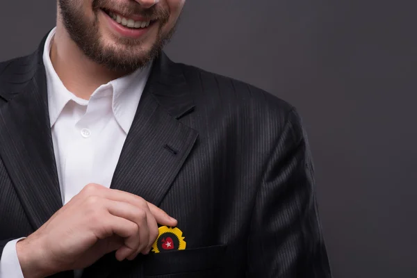 Man   hiding  card  into coat — Stock Photo, Image