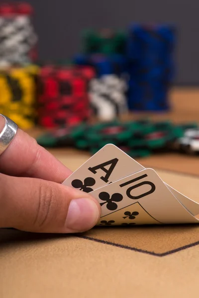 Chips in piles with cards — Stock Photo, Image