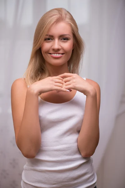 Blond girl   in white  T shirt — Stock Photo, Image