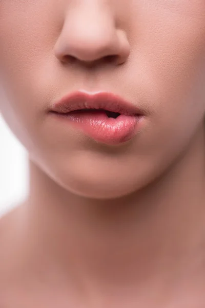 Girl lips biting — Stock Photo, Image