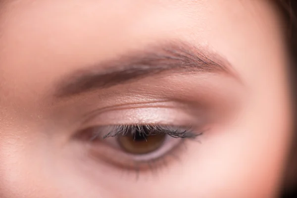 Olho de mulher marrom — Fotografia de Stock
