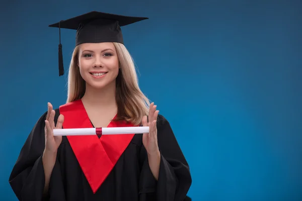 Student girl holding bundle of sheet of paper — Stock Photo, Image