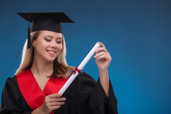 Student girl holding bundle of sheet of paper — Stock Photo, Image