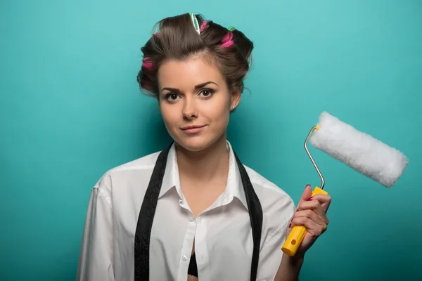 Vrouw met peddel roller — Stockfoto