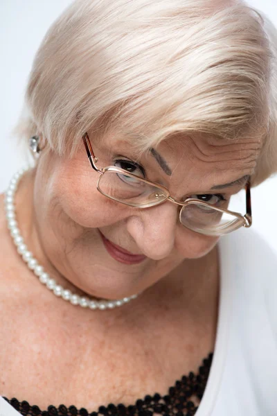 Closeup of lovely elderly woman — Stock Photo, Image