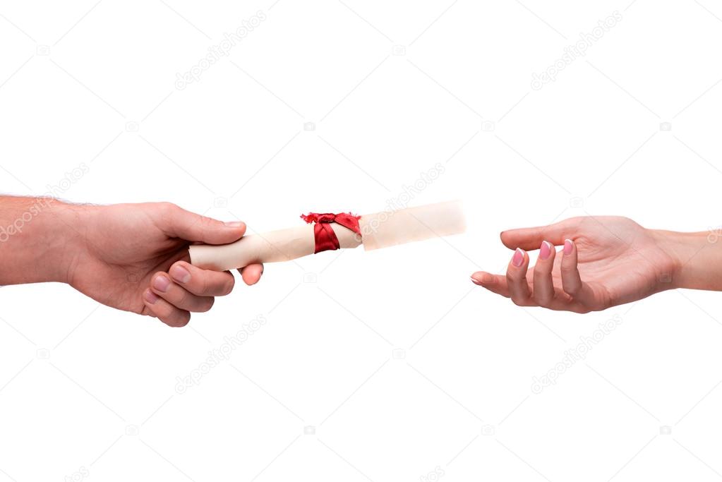 Hand giving rolled parchment with ribbon