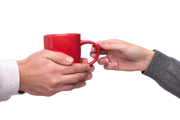 Hand reicht einen Becher Kaffee — Stockfoto