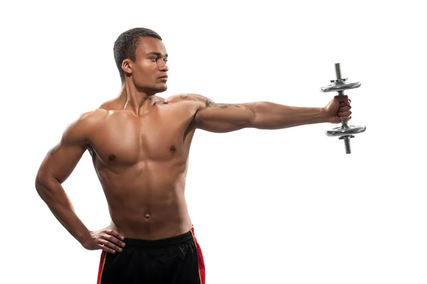 Young African sportsman exercising dumbbell — Stock Photo, Image