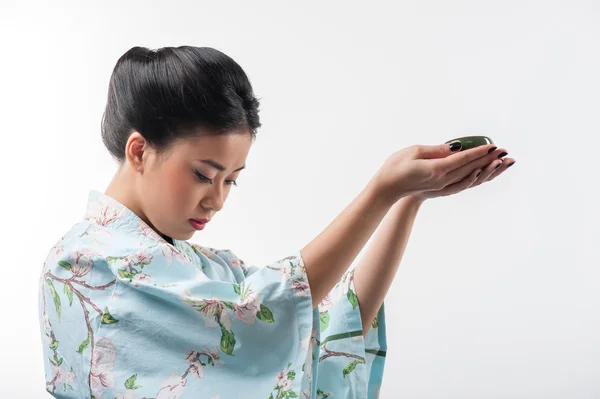 Tea ceremony conducted by Asian woman — Stock Photo, Image