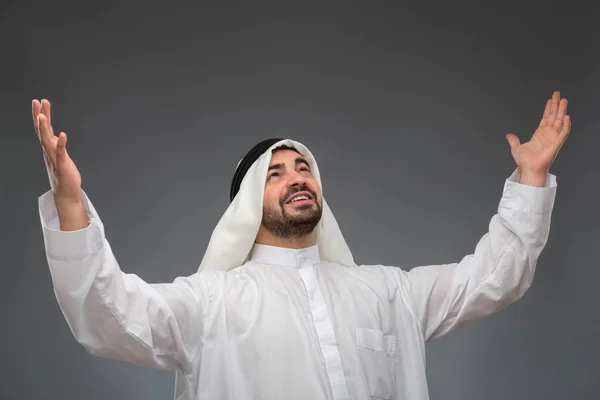 Arab businessman raising his hands — Stock Photo, Image