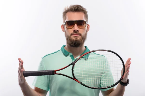 Hombre sosteniendo raqueta de tenis —  Fotos de Stock