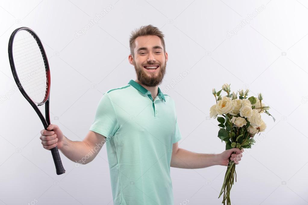 Tennis player with bouquet of flowers