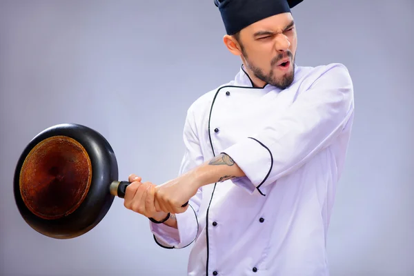 Portrait of young handsome cook — Stock Photo, Image