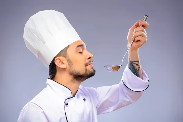 Portrait of young handsome cook — Stock Photo, Image