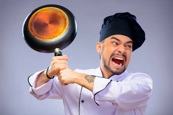 Portret van de jonge knappe kok — Stockfoto